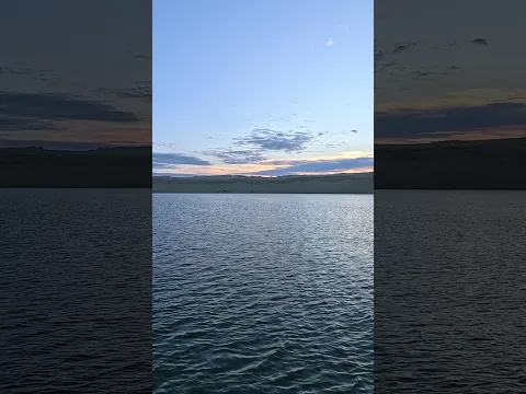 The Sandy Dunes of Nida, Lithuania, from the Laguna at Sunset