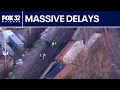 Lagu Freight train derailment in Chicago suburb sparks delays