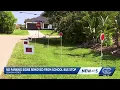 Lehigh Acres woman removes do not park signs near bus stop after legality questioned