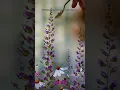 Download Lagu Wildflowers over a blurry background