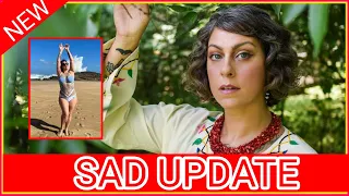 American Pickers star Danielle Colby shows off curves in - while sunbathing at the beach in new pics