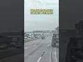 Dashcam captures tractor-trailer striking overpass and overturning on Thruway in Nyack