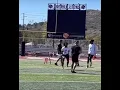 Kid Picks of Aaron Rodgers and hands the ball to him