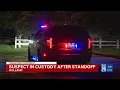 1 in custody after hourslong standoff in Holland