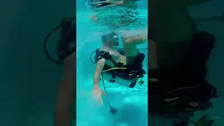 Scuba training in the pool: how to put BCD back on. #sailingbyefelicia