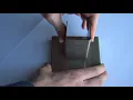 Fastening sheet metal Elastic flanges in mating part with slots