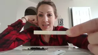 Pregnancy test behind the plastic