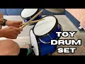 I bought my kids a toy drum set and tried it out first