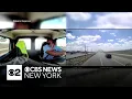 shows United flight crashing into truck on New Jersey Turnpike