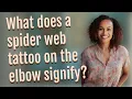 What does a spider web tattoo on the elbow signify