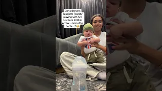Chris Brown s daughter Royalty playing with her newborn brother Arrow bless the bottle