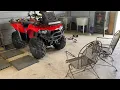 Adjusting the on my Bruteforce using twine and patio chairs