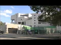 Viral shows line of police cars waiting to drop off arrestees at Miami-Dade jail