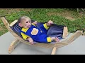 Baby monkey Xuka's reaction when her aunt's husband made her a new hammock.