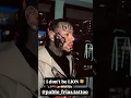 6ix9ine shows off his new lion face tattoo