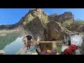 Catching a giant fish in the Khersan River. The simple and beautiful life of nomads in the mountains