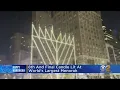 8th and final candle lit on world s largest menorah