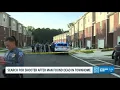 Police searching for suspect after man found dead in townhome