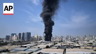 Smoke plumes rise in Sharjah and Dubai as Iran launches strikes at UAE