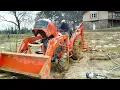 Getting my Kubota Tractor Unstuck from Giant Mud Hole using LA525 Front Loader and BH77 Backhoe