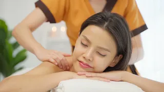 Asian young woman feeling happy and relax during Massage