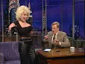 Dolly Parton Does a Striptease Late Night with Conan O Brien