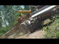 Tigercat Skidder Deere Track Feller Buncher building a road