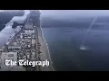 Download Lagu Waterspout crashes on to beach full of people in Miami, Florida