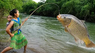 Girl fishing: primitive fishing catch big fish at river, Catching Huge Fish in a Small Stream