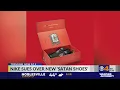 Nike sues over Satan shoes