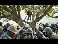 Download Lagu A kung fu boy soars through trees with lightness skill, not a single enemy bullet can hit him.