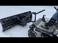 Nordic Plow in use on a Zero Turn Mower