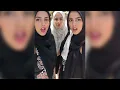 Muslim Hijabis Tongue kissing in beautiful architecture Lesbians Kissing