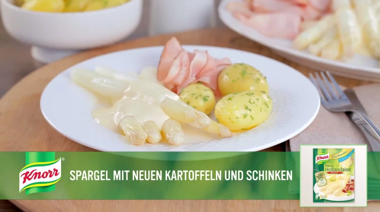 Spargel mit Sauce Hollandaise, Petersilienkartoffeln und gekochtem Schinken (lang). 