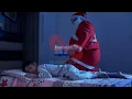 Santa Claus keeping the Christmas gift beside a sleeping boy o... | Indian Stock Footage | Knot9