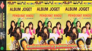 Download PENGOBAT RINDU by Leo Waldy dkk. Cover Album Dangdut Lawas. MP3