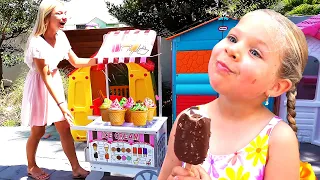 ديانا وروما يلعبان متجر الآيس كريم 