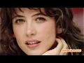 Sophie Marceau Flaunts Her Famous Curves in Tiny Bikini