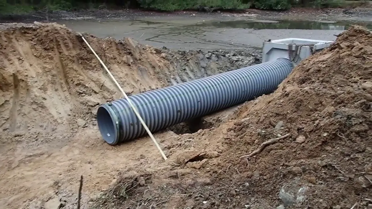 Installing The New Overflow On The Failing City Pond