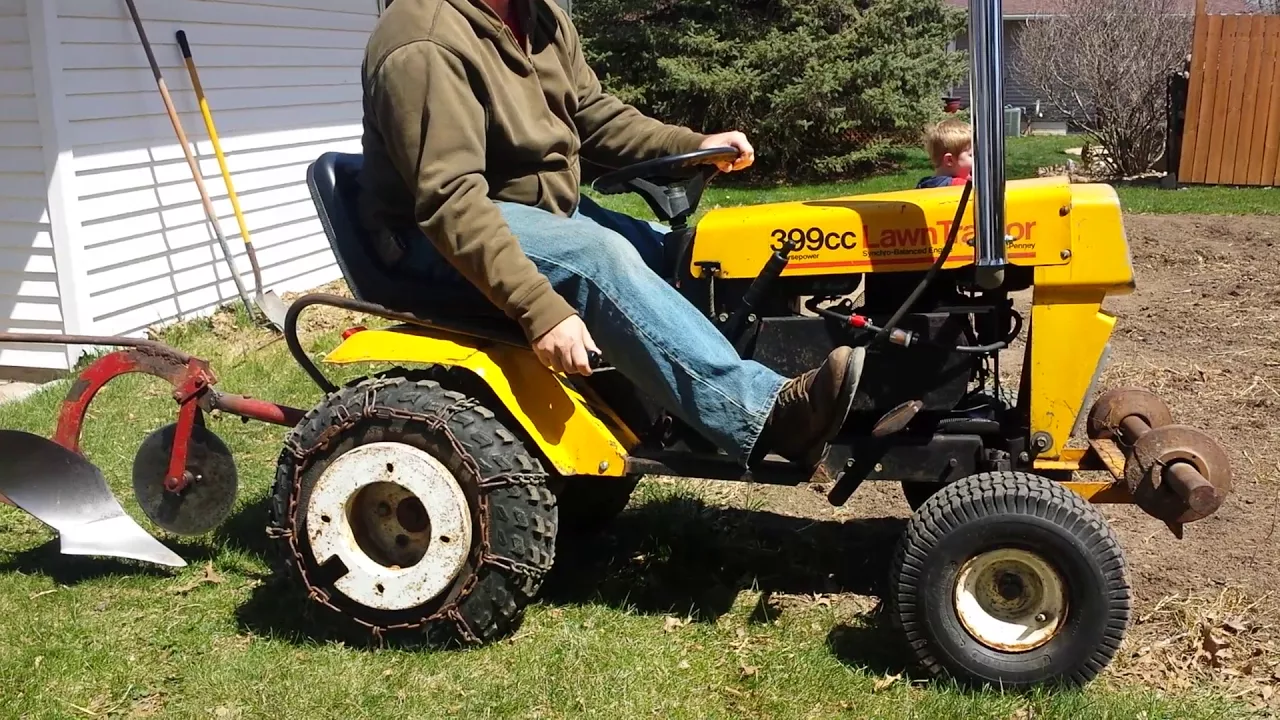 Plowing garden with a 1975 JCPENNEY lawn tractor