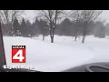 Blizzard ice storm slam northern Michigan s urge residents to stay off roads