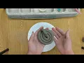 Coil snake sculpture