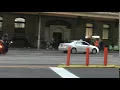 Silver top taxi does a U-turn Flinders St