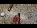 guy fires an eoka he made in his garage