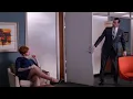 Christina Hendricks oops stockings Mad Men Joan Harris shows the top of stockings