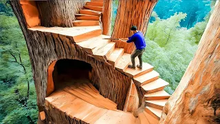 رجل يبني بيتا سريا من الأشجار في قلب الغابة من البداية للنهاية بطريقة مذهلة 