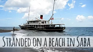 Stranded on a beach in Saba— Sailing Uma [Step 83]