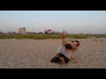 Wrestling my wife at the beach round 3