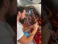 Painting 2 semi trucks with chains and flames