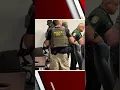 shows arrest of Osceola Sheriff Marcos Lopez by federal agents